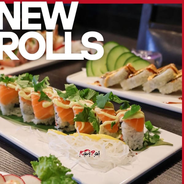 Kanpai Sushi's new salmon rolls with avocado, cilantro, and sauce, with other rolls in the background.